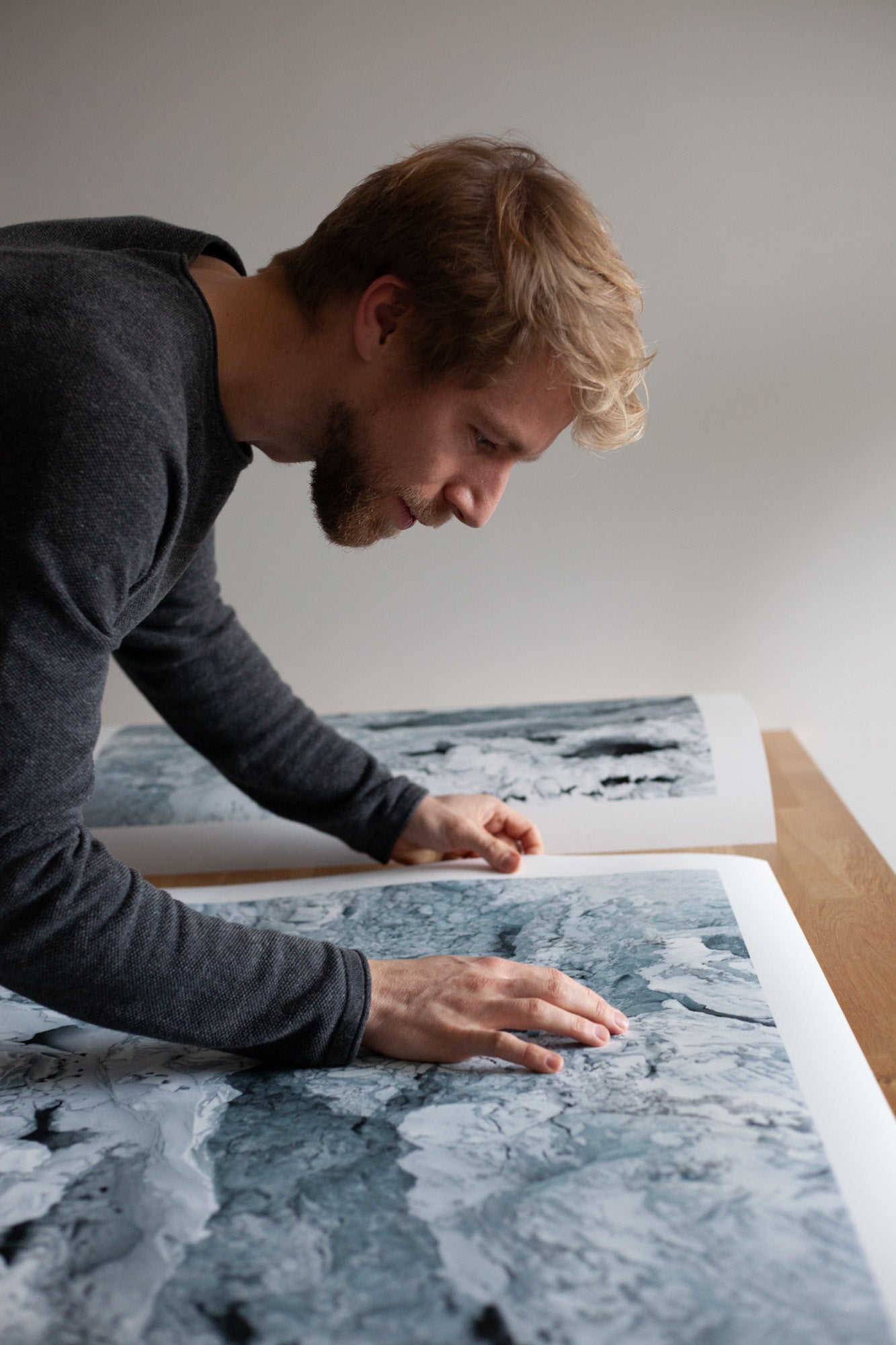 Photographer Chris Konig inspecting his fine art print 