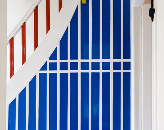 The artwork 'Van Doesburg-Rinsemahuis #11' by Jildo Tim Hof showing a bright blue and white intricately patterned wall