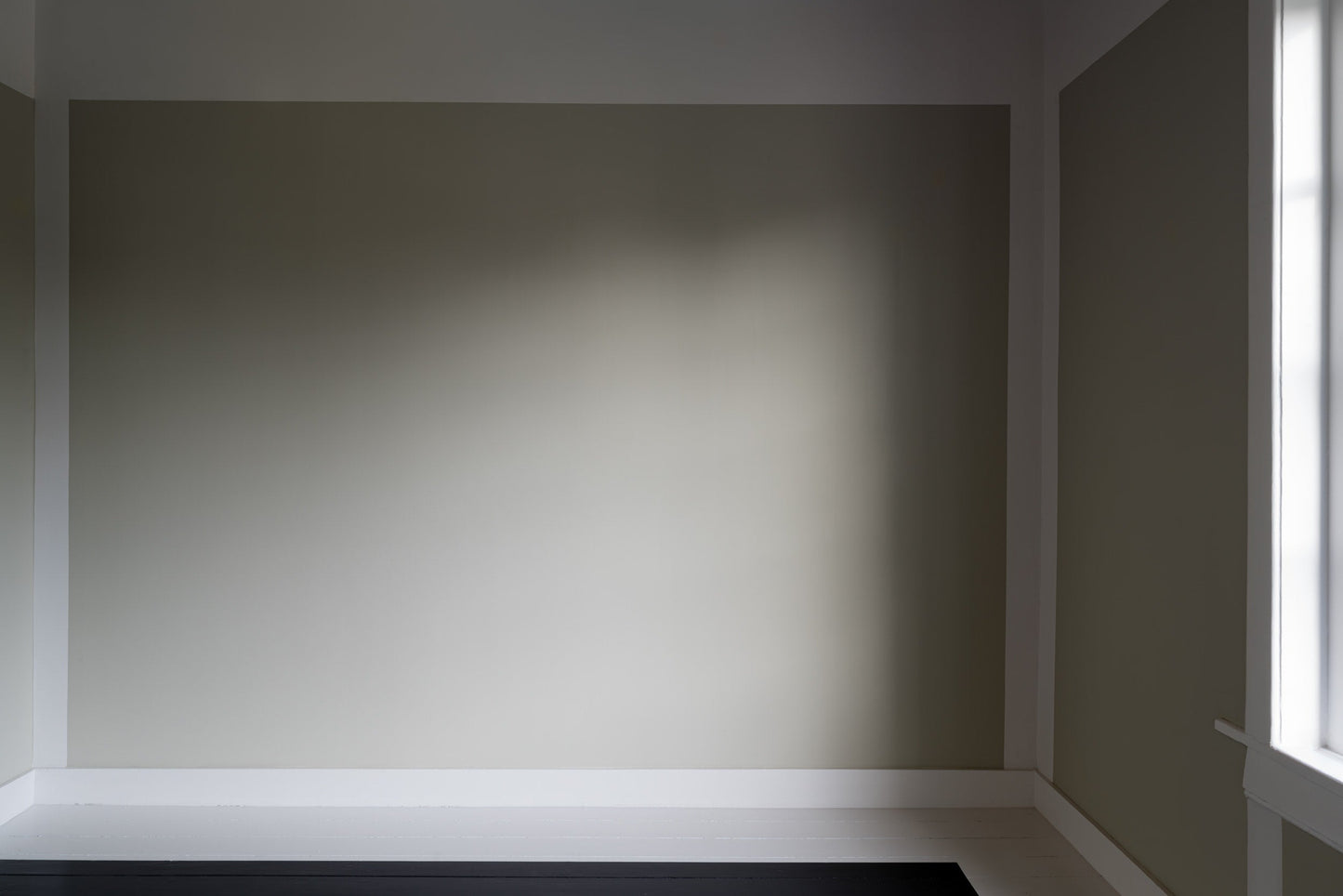The artwork 'Van Doesburg-Rinsemahuis #8' by J.T. Hof displaying a composition of 2 grey walls with straight white lines