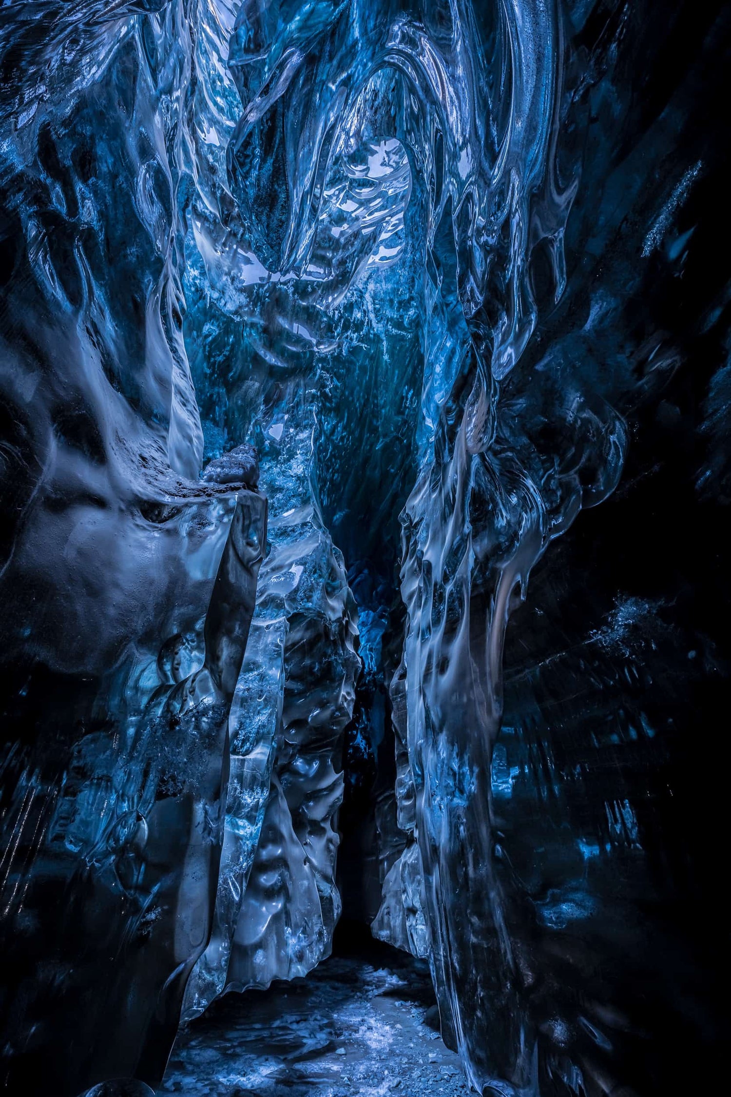 The artpiece 'Anatomy of Ice' by Markus van Hauten which shows an intricately patterned ice cave wall and ceiling.