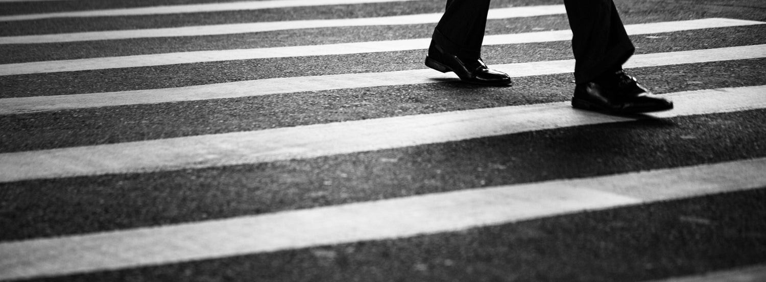 Cross walk with shoes on the street